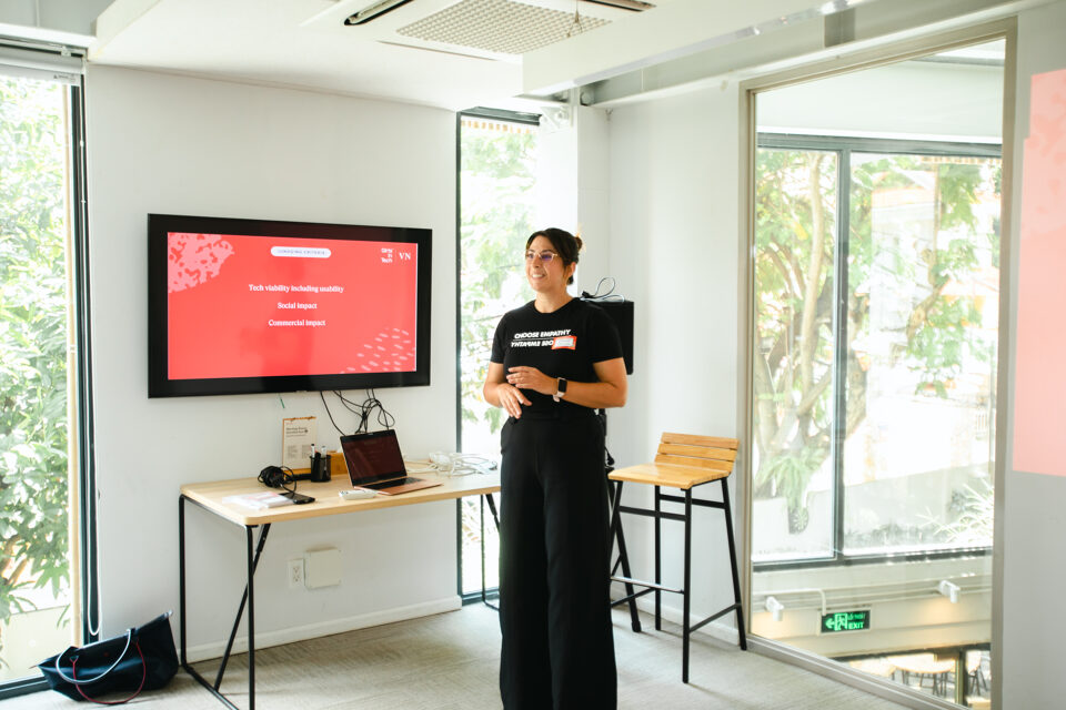 Kalina presenting a Claude Cowork workshop to a group
